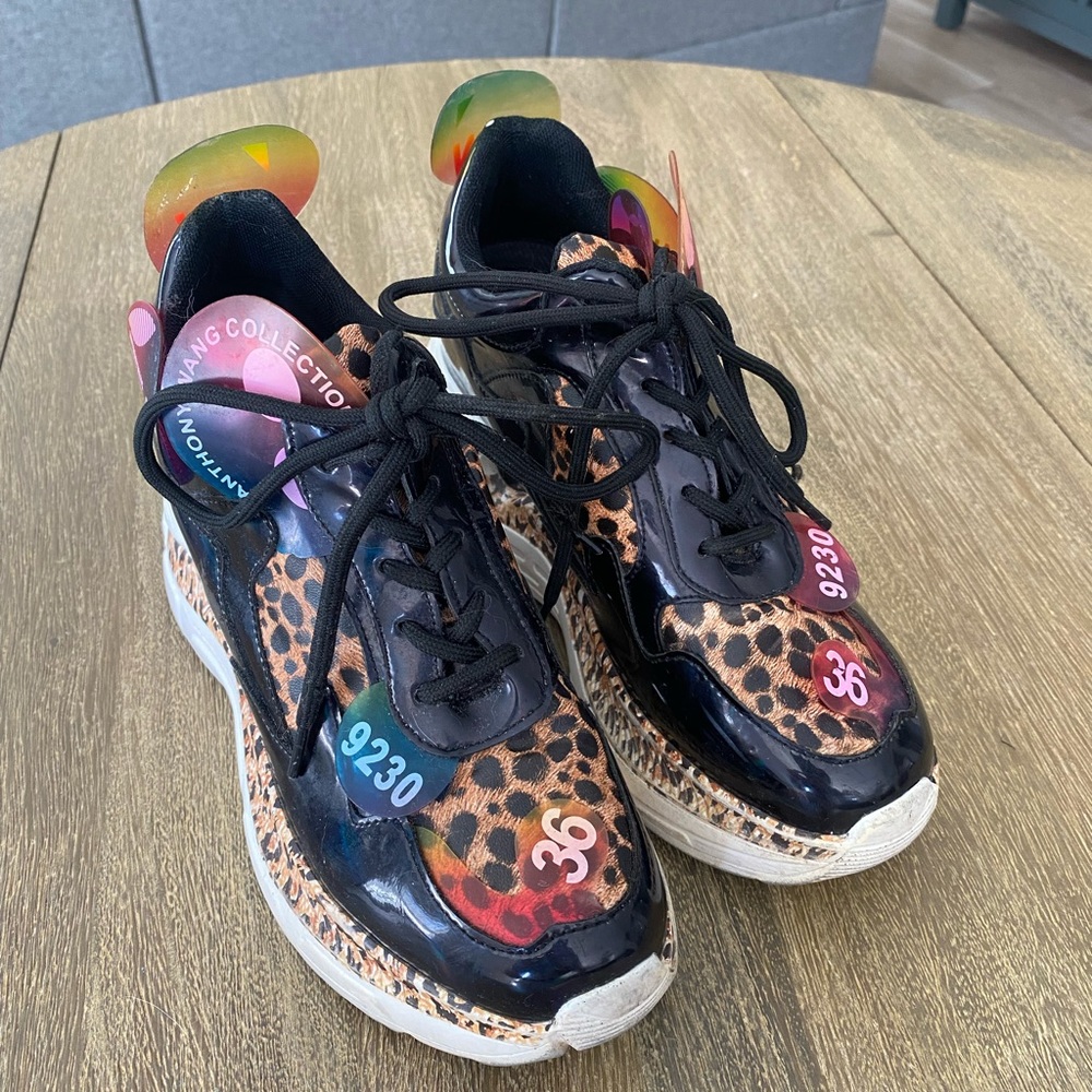 Alexander Wang platform tennis shoes in cheetah print. Size 7.5
